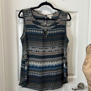Emi & Joe Sleeveless Multicolored Blouse. Size Large. 100 % Polyester. Hand Wash